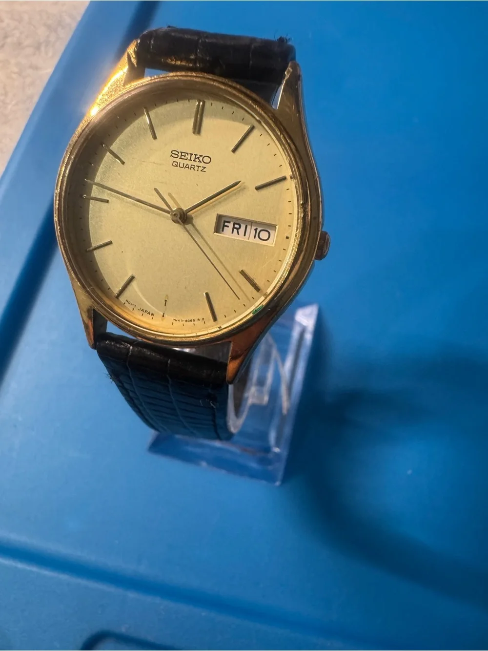 Seiko Gold Dial Watch with Black Strap
